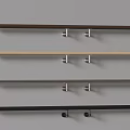 Various Colored Wall Mounted Hanging Rods With Metal Brackets On Gray Wall