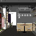Qing Yang Photography Studio Interior With Display Shelves Photos And Chairs