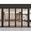 Modern Commercial Entrance With Black Frame Glass Sliding Doors And Lobby Interior