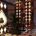 Stylish Bar Interior With Large Spade Symbol Diamond Pattern Screens And Plant Decor