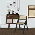 Modern Rattan Accent Chair With Black Frame Wooden Cabinet And Wall Decor
