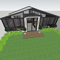 Modern Glass Building With Black Frame Roof Green Plants Wooden Deck Lawn Entrance