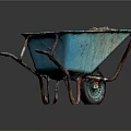 Blue Garden Wheelbarrow Filled With Dark Soil And Rusty Metal Handles