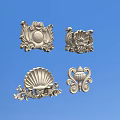 Silver Metal Carved Decorations With Various Shell And Scroll Designs On Blue Background