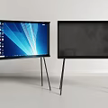 Two Modern Flat Screen Televisions With Tripod Stands In Minimalist Room