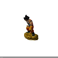 Goku Dragon Ball Anime Character in Orange Martial Arts Uniform Fighting Stance on Cloud Base