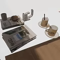 Stacked Modern Magazines With Coffee Mugs Saucers And Geometric Decor By Window Blinds