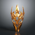 Ornate Golden Decorative Mask With Spiked Top And Intricate Central Design
