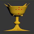 Golden Decorative Cup With Star Shaped Base Red Accents And Petal Like Rim