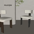 Poliform Dining Chairs With White Seat And Dark Legs By White Wall And Green Plant