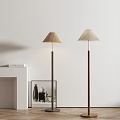 Modern Minimalist Floor Lamps With Light Colored Shades And Dark Wooden Bases In Living Room