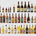 Assorted Wine and Beer Bottles With Glasses in Colorful Display Arrangement
