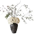 Gray Textured Vase With White Hydrangea Flowers Red Berries And Green Leaves