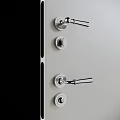 Multiple Chrome Door Handles On White Door With Modern Stylish Decorative Design