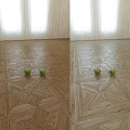 Geometric Patterned Wooden Floor With Two Green Apples In Natural Sunlit Room