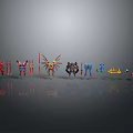 Various Colorful Character And Creature Models Arranged On Reflective Gray Surface