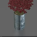 Bonsai Potted Plant with Vibrant Red Leaves in Blue Cylindrical Pot Against Light Blue Background