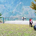 Scenic Mountain View Bridge With People Walking Green Trees And Car Nearby
