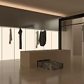 Modern Clothing Store Interior With Hanging Clothes And Wooden Display Counter