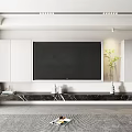 Modern Minimalist TV Background Wall With White Cabinets Black Marble Stand And Green Plant Decorations