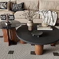 Modern Coffee Tables In Living Room With Black Tops Wooden Legs And Dried Flowers Vase
