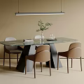 Minimalist Dining Table And Beige Chairs With Marble Top Black Legs And Green Plant