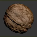 Close Up Of Single Whole Brown Walnut With Textured Surface On Gray Background