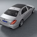 Silver Luxury Sedan With Black Roof Modern Design And Elegant Front Styling