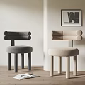 Gray And Beige Dining Chairs With Cylindrical Armrests And Legs Light Colored Walls Wooden Floors