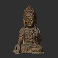 Ancient Bronze Buddha Sculpture Carving With Intricate Headdress And Seated Hand Gestures