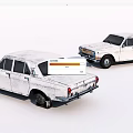 Two White Old Worn Rusty Vintage Cars Against White Background
