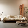 Natural Interior With Beige Three Seater Sofa Terracotta Vase Wooden Coffee Table And Green Plant