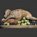 Golden Brown Roasted Chicken Served on Wooden Plate with Blue and Green Grapes