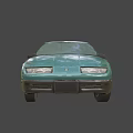Vintage Green Four Door Sedan With Classic Front Headlights And Body Design