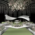 Banquet Hall with Modern Chandelier Stage Green Carpet White Decorations and Flower Arrangements