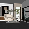 White Round Accent Chair in Modern Minimalist Space with Green Plants and Natural Light