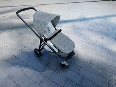 Modern Gray Patterned Stroller With Black Frame On Outdoor Paved Ground 3d model