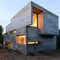 Modern Detached Villa with Concrete Exterior Geometric Design Illuminated Windows Evening View