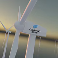 Offshore Wind Turbines with Rotating Blades on Calm Water Surface at Sunset