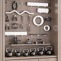Organized Sports Equipment Storage Cabinet With Dumbbells Kettlebells Yoga Balls And Foam Rollers
