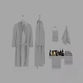 High Quality Soft White Bathrobes Hanging Towels and Folded Linens with Toiletries