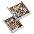 Cutlery Set Organized in Drawer with Wooden Dividers and Stainless Steel Utensils