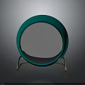 Green Circular Decorative Mirror With Gold Metal Stand And Reflective Surface