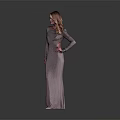 Child In Silver Long Dress Standing Against Gray Background With Hand On Hip