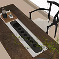Elegant Tea Set Arranged On Wooden Table With Tray Cups And Green Plants Near Chair