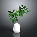 White Ceramic Vase With Lush Green Leaves In Modern Interior Decor Setup