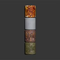 Stacked Cylindrical Sculpture Carvings Featuring Various Colors Textured Surfaces And Diverse Patterns