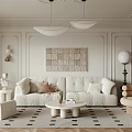Modern Living Room Interior With White Sofa Round Coffee Table Geometric Rug And Decorative Artwork