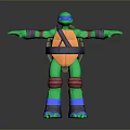 Ninja Turtle Action Figure With Green Body Orange Shell Colored Armor And Outstretched Arms