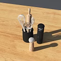 Essential Kitchen Utensils on Wooden Countertop with Whisk Rolling Pin and Spice Jar